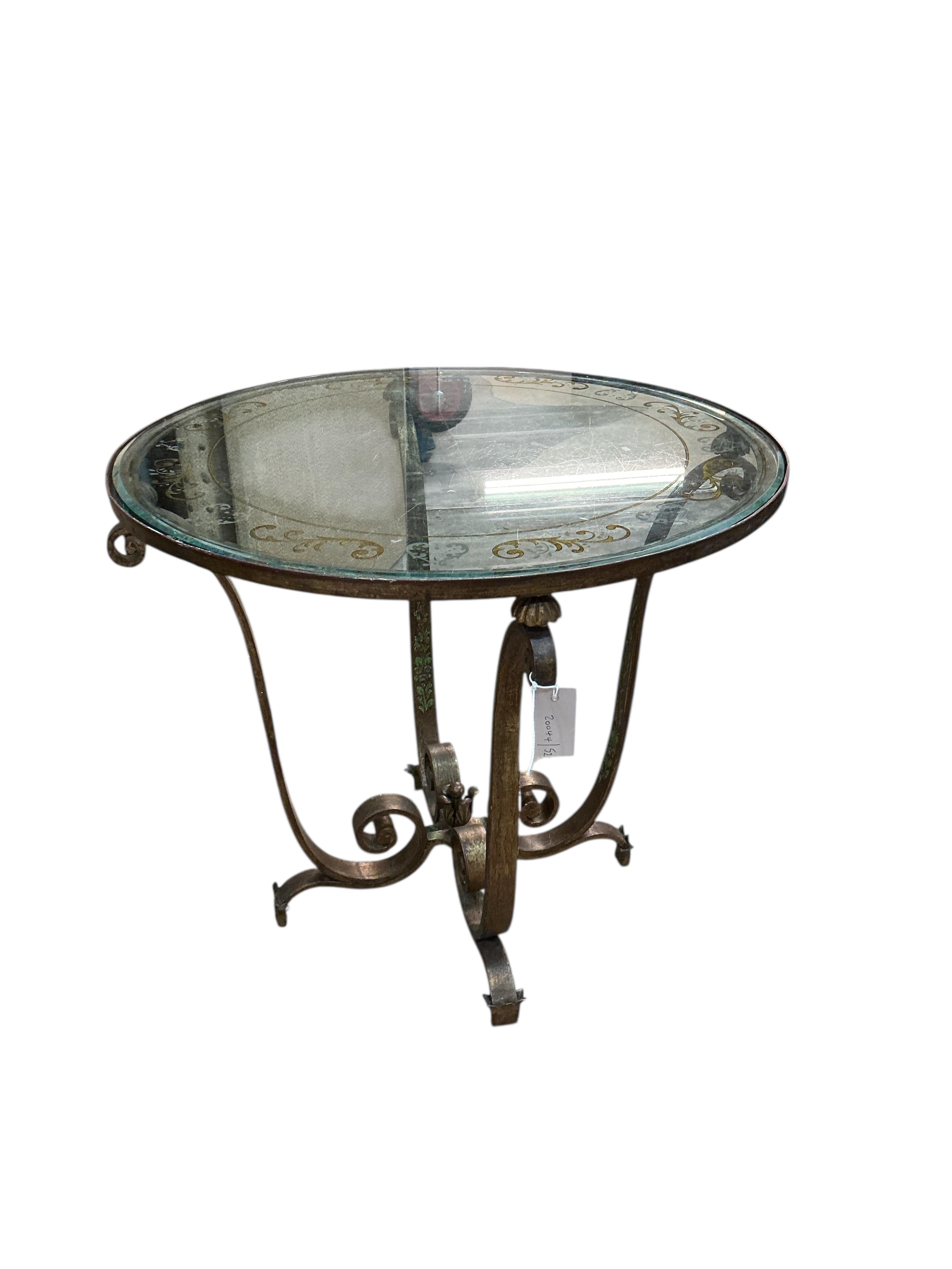 In the manner of Raymond Subes, a circular engraved glass and patinated wrought iron occasional table, diameter 70cm, height 62cm